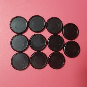 11 solid black plastic planner discs